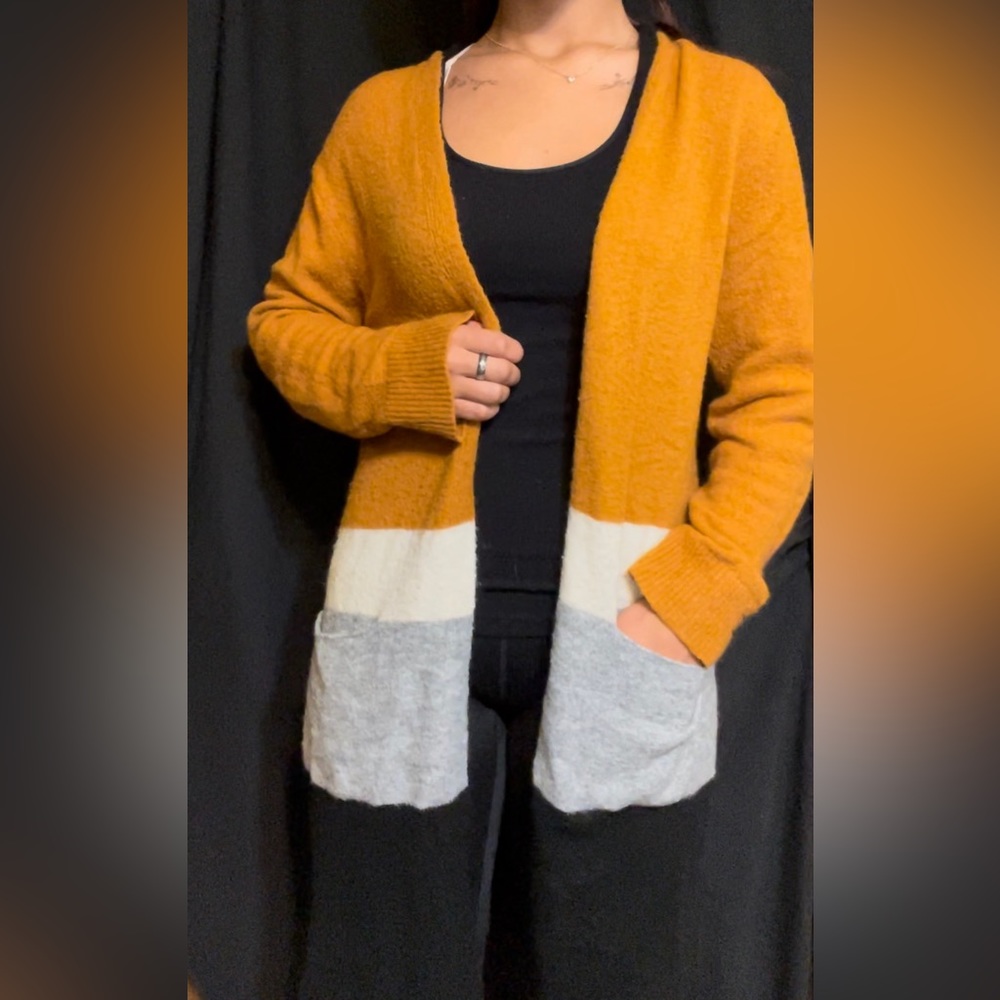 Cute and cozy large Women’s long cardigan.